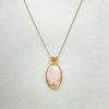 Pendentif en scolecite et fil de cuivre doré