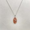 Pendentif en pierre du soleil
