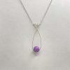 Pendentif en kunzite mauve et fil de cuivre bronze
