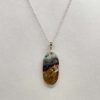 Pendentif en bois fossilisé et argent 925