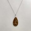 Pendentif en bois fossilisé et argent 925