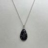 Pendentif en corail fossilisé noir