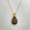 Pendentif en jaspe océan et fil de cuivre doré