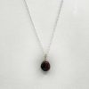 Pendentif en opale de bois noir et fil d'argent 925